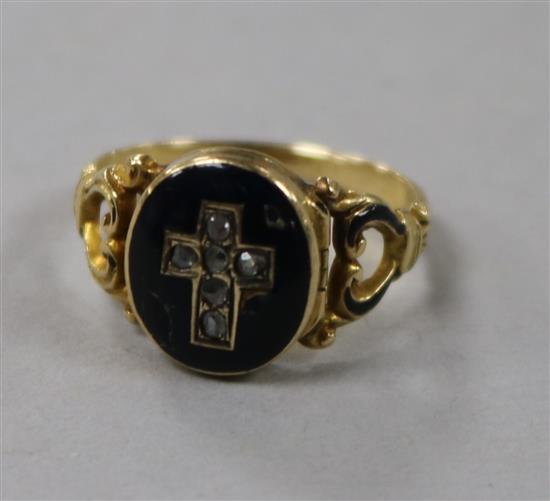 A Victorian yellow metal, blue enamel and rose cut diamond set locket mourning ring, size I.